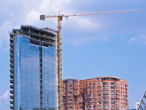 Cranes and building construction Stock Photos