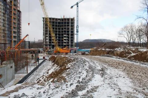 Cranes and building construction Stock Photos