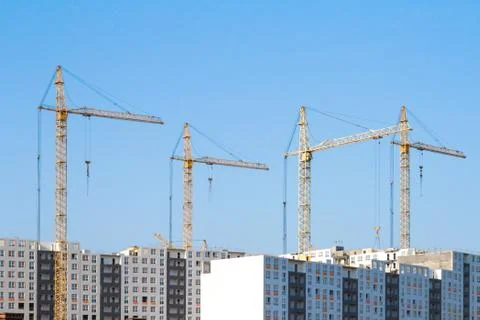 Cranes and building construction Stock Photos