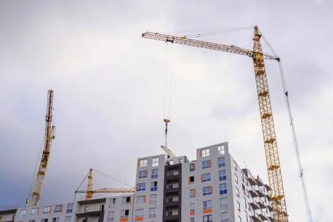 Cranes and building construction Stock Photos