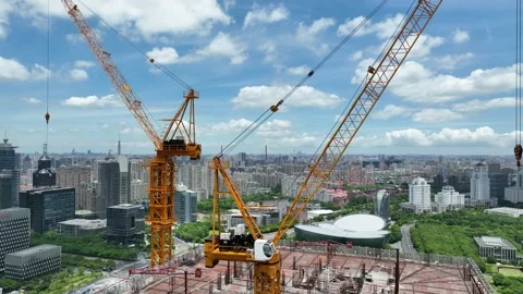 Cranes and construction site in the city. Drone aerial view Stock Footage 221014773
