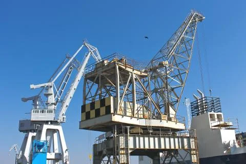 Cranes and ship under construction at the shipyard Stock Photos