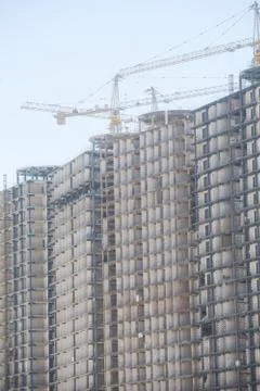 Cranes building a block Stock Photos