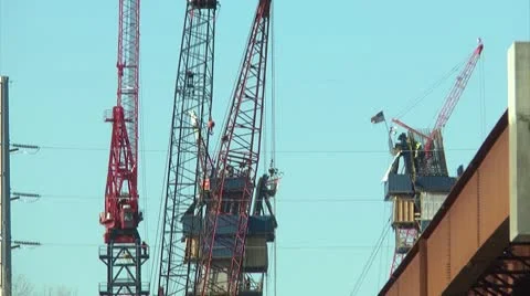 Cranes building a bridge Stockbeeldmateriaal 10595304