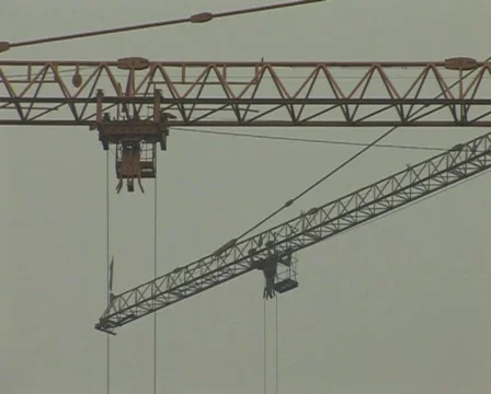 Cranes constructing buildings under pollution Stock Footage 285342