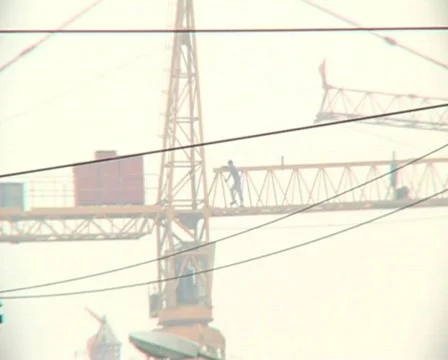 Cranes constructing buildings under pollution Stock Footage 285348