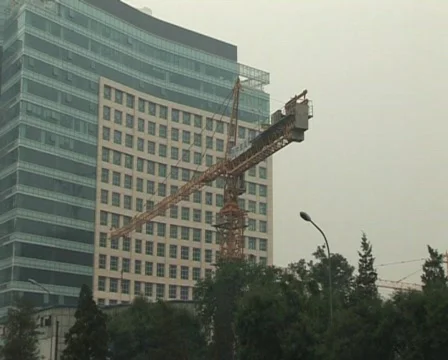 Cranes constructing buildings under pollution Stock Footage 285361