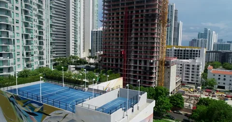 Cranes constructing a new tower in Edgewater Stock Footage 197090860