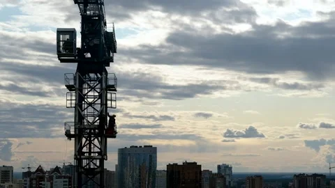 Cranes, construction crane equipment over building. technology transportation Stock Footage 130885511