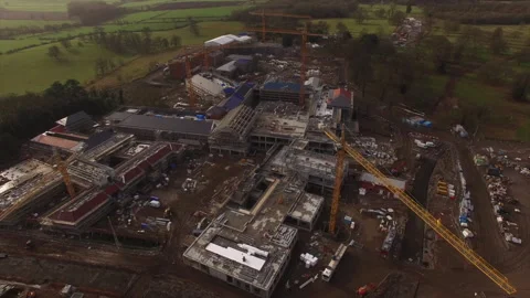 Cranes At A Construction Site Aerial  Stock Footage 146515497