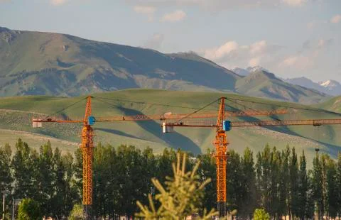 Cranes at the construction site Stock Photos