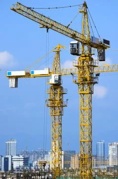 Cranes on construction site Stock Photos