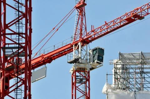 Cranes on a construction site Stock Photos