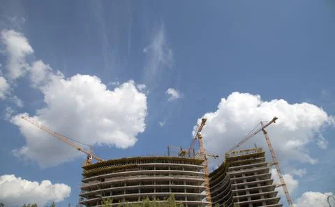 Cranes on a construction site Stock Photos