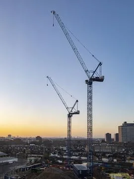 Cranes on a construction site Stock Photos