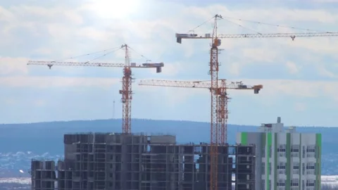 Cranes on construction site, timelapse Stock Footage 130837179