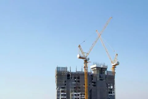 Cranes  on the daylight and working Stock Photos
