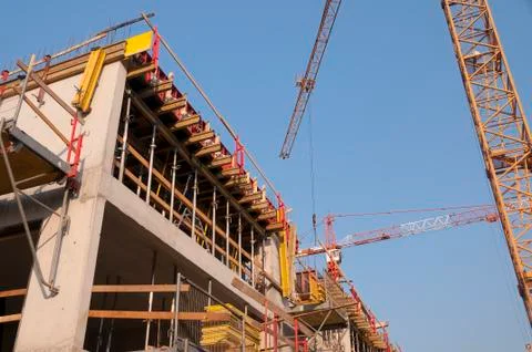 Cranes at developing the building 스톡 사진