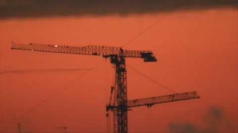 Cranes at dusk sky Stock Footage 49651098