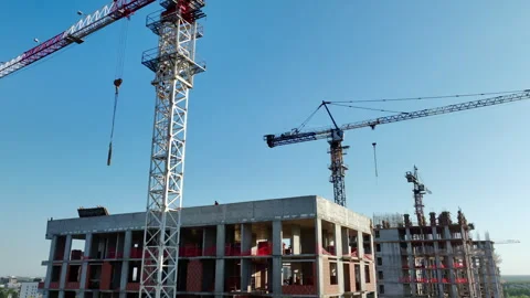 Cranes facilitate construction of buildings streamlining process 動画素材 264097687