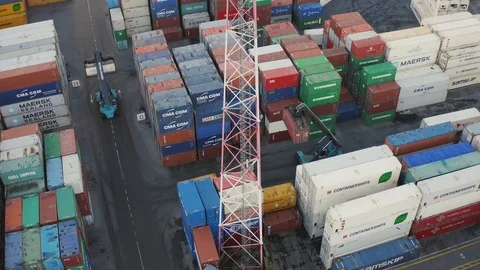 Cranes Lifting And Moving Containers Around A Cargo Station 動画素材 98879497