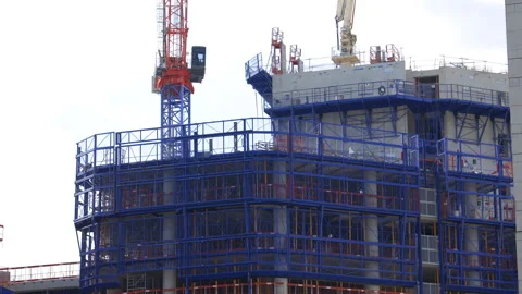 Cranes of Lightwell building under construction in La Defense district in Paris  Stock Footage 255201572