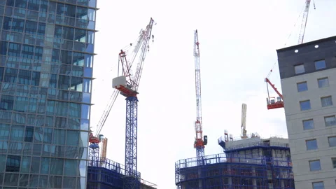 Cranes of Lightwell building under construction in La Defense district in Paris  Stock Footage 255201598