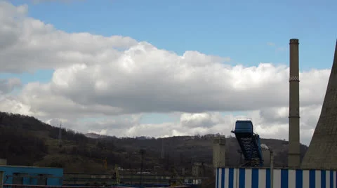Cranes loading coal  powerstation pan right Stock Footage 24713603