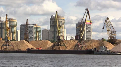 Cranes for loading sand on the city river bank Stock Footage 39680136