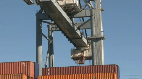 Cranes moving containers at the port Stock Footage 604523