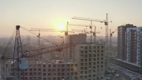 Cranes over building a house Stock Footage 170756822