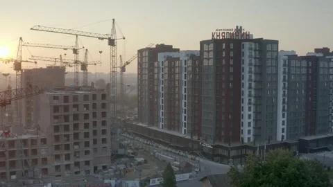 Cranes over building a house Stock Footage 170756825