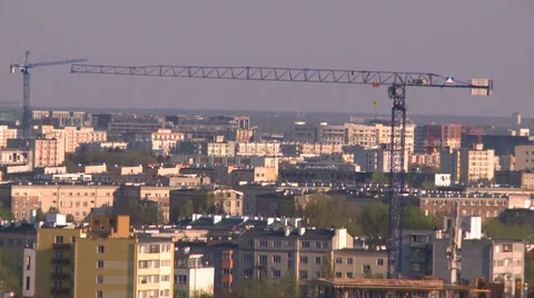 Cranes with plane in the background Stock Footage 35290583