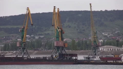 Cranes at the port of loading cargo ship Stock Footage 50127122