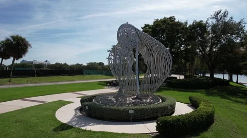 CRANES ROOST PARK  RIGHT ORBITING DRONE SHOT OF THE NURTURE ART SCULPTURE Stock Footage 244539430