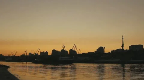 Cranes silhouetes at sunset Stock-Footage 10860378
