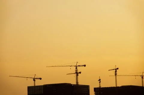 Cranes silhouette Stock Photos