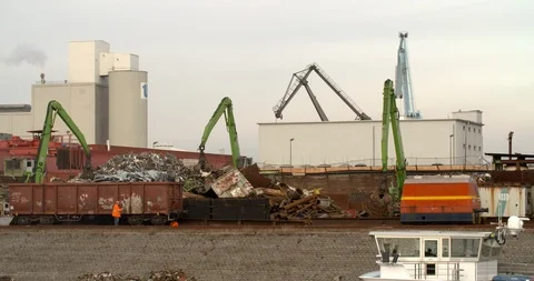 Cranes sorting metal scrap, busy recycling company, Germany 4K Stock Footage 102894785