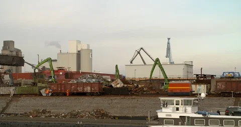 Cranes sorting metal scrap, busy recycling company, Germany 4K Stock Footage 102894811