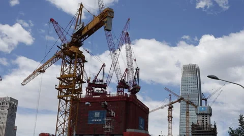 Cranes work at a construction site on a sunny day in Beijing's central business Stock Footage 51140809