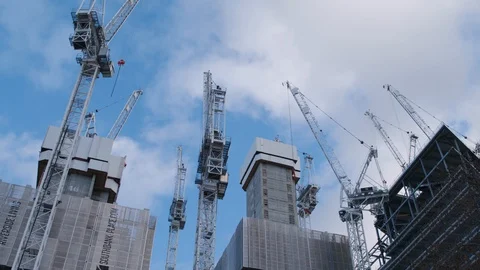 Cranes work on the construction of skyscrapers and tower blocks in London Video stock 129788351