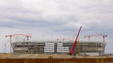 Cranes at work time lapse. Stadium construction timelapse. The construction.. Stock Footage 74691841