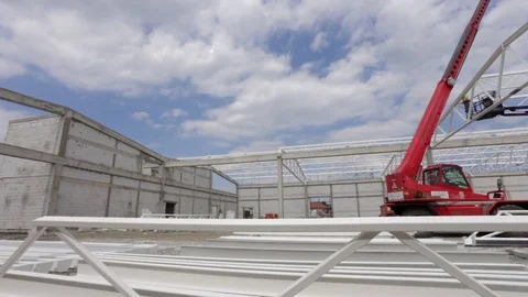 Cranes working on construction site Stock Footage 79450322