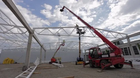 Cranes working on construction site Stock Footage 79469097