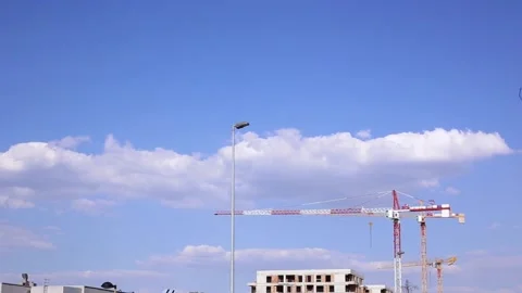 Cranes working on construction site Stock Footage 202690242