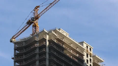 Cranes working on the construction site Stock Footage 236536796