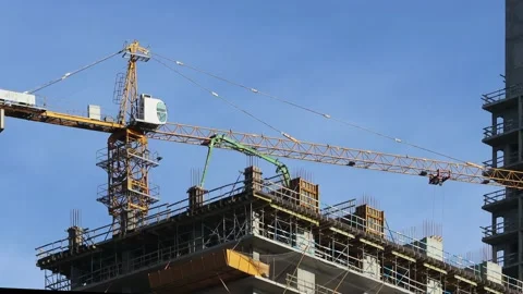 Cranes working on the construction site Stock Footage 236536805