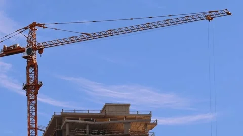 Cranes working on the construction site Stock Footage 237015320