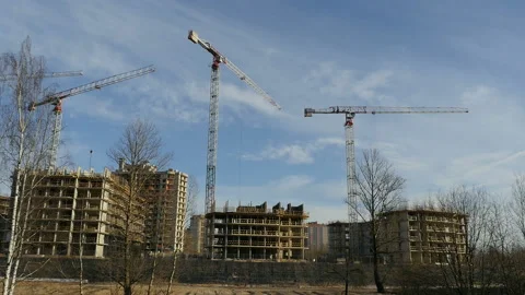 Cranes working on the high-rise building construction Stock Footage 124203817