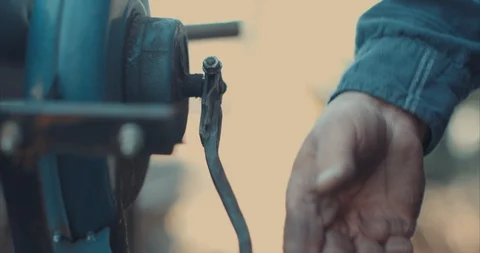 Cranking air into a blacksmith's forge Video stock 105296579